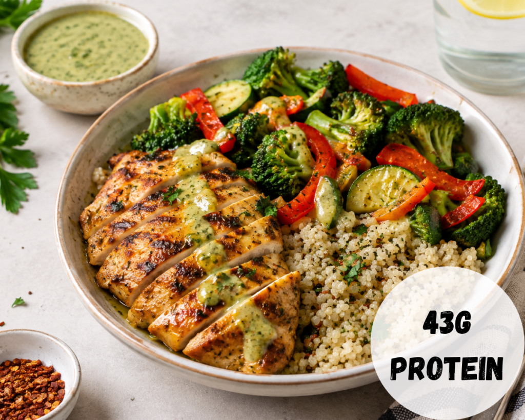 Grilled herb chicken quinoa bowl with roasted vegetables